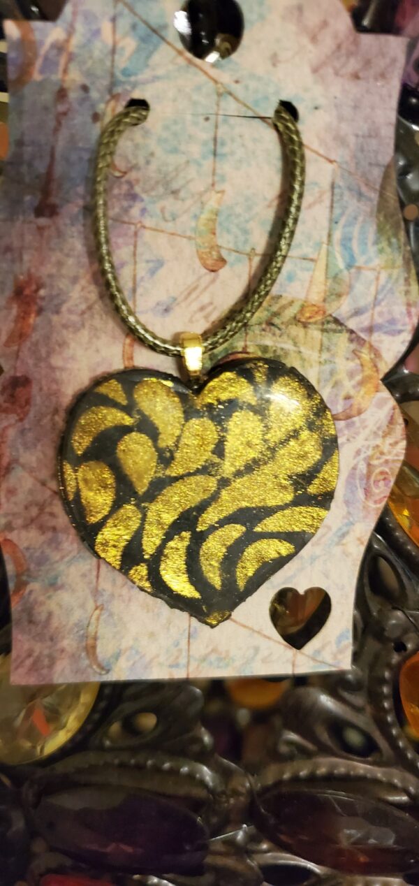 Large grey heart with gold accents